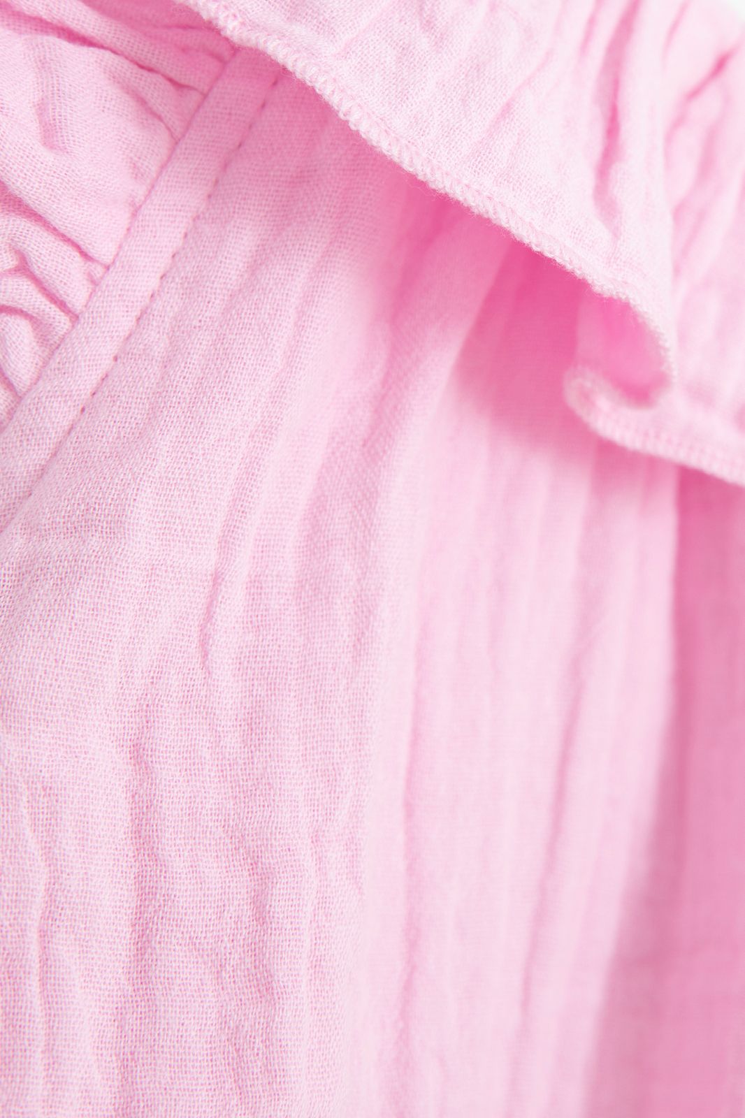 Lichtroze mousseline top met ruffles