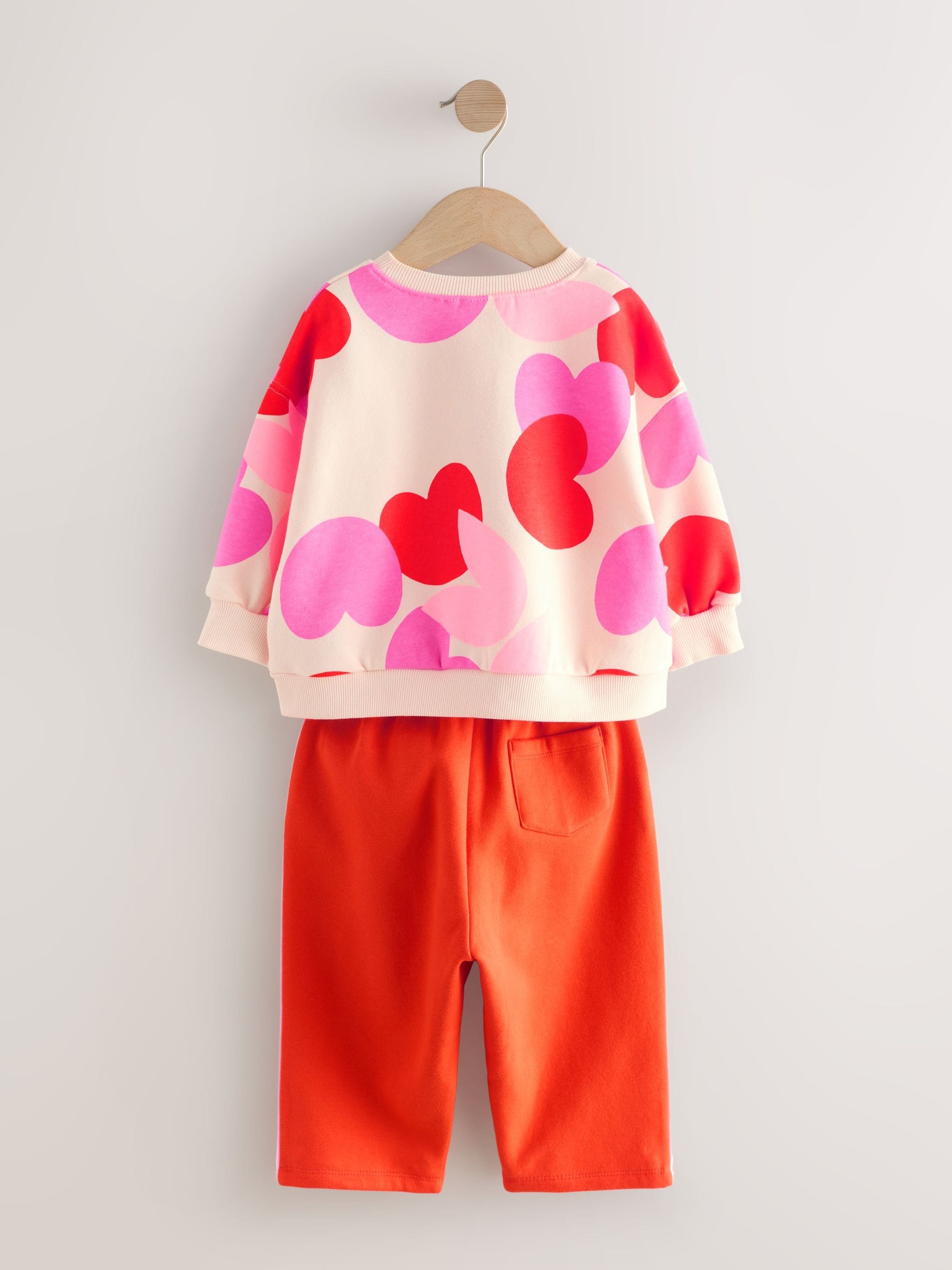 Roze/rood met hart - Set van sweatshirt en joggingbroek met rechte wijde pijpen (3mnd -7jr)