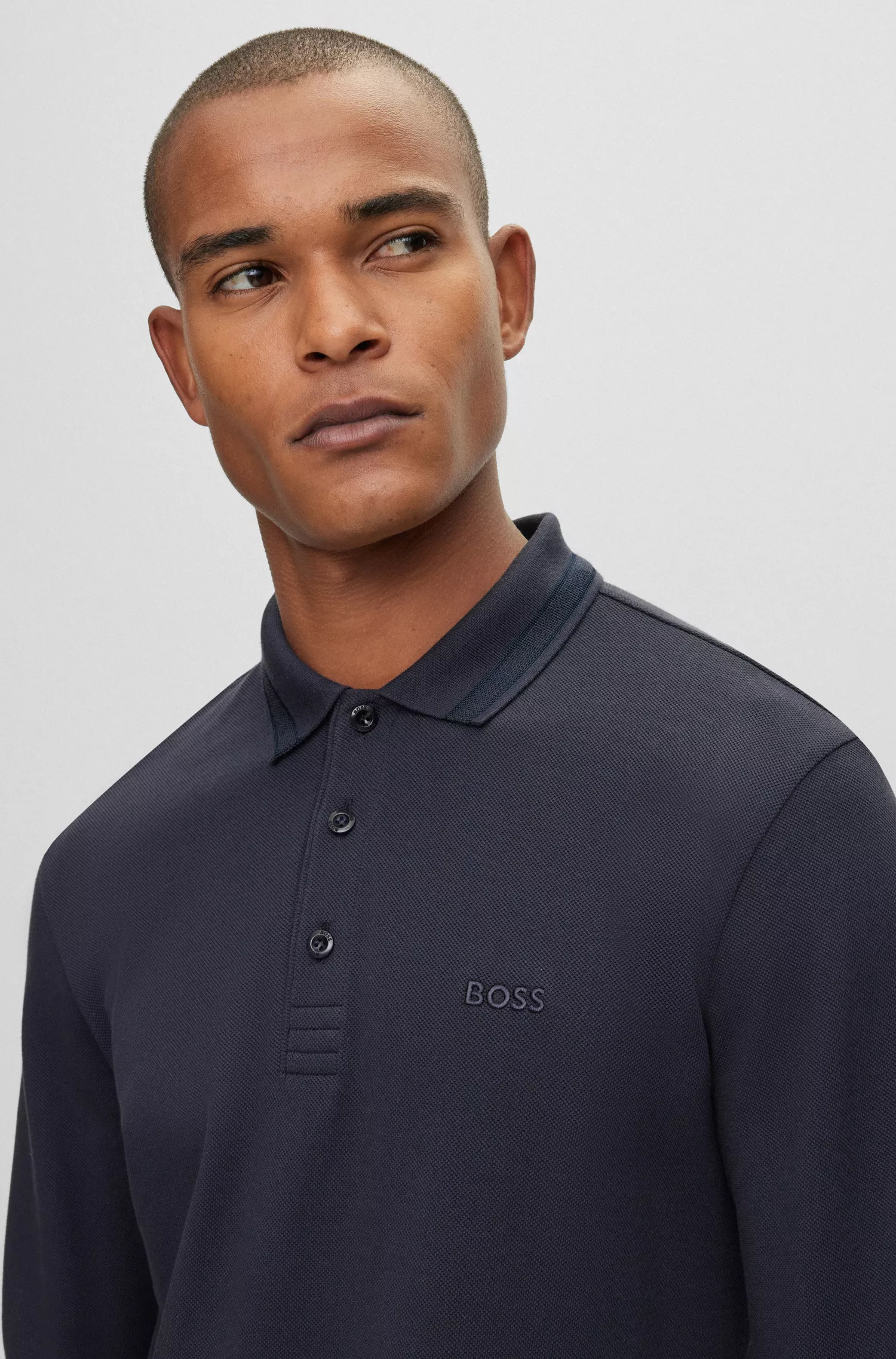 Camisa polo BOSS verde de manga comprida em piqué de algodão com logotipo contrastante.