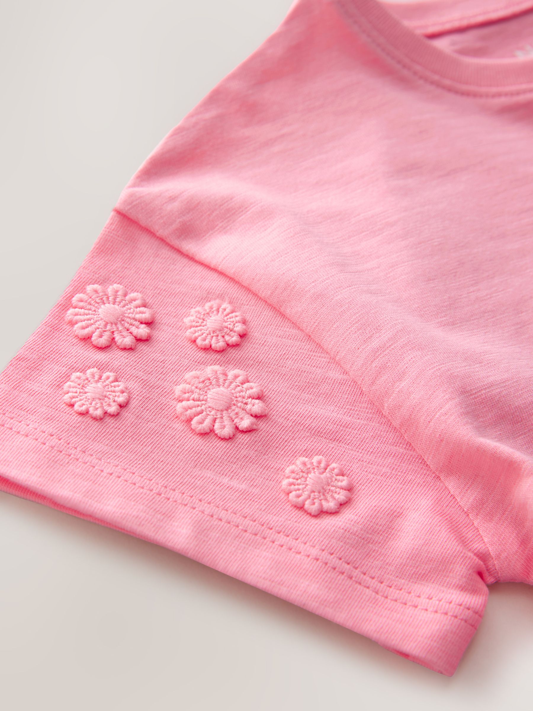 Roze - 100% katoenen T-shirt met korte mouwen en madeliefjesprint (3mnd -7jr)