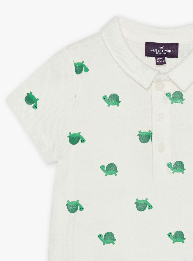 Polo écru avec tortues reliefées