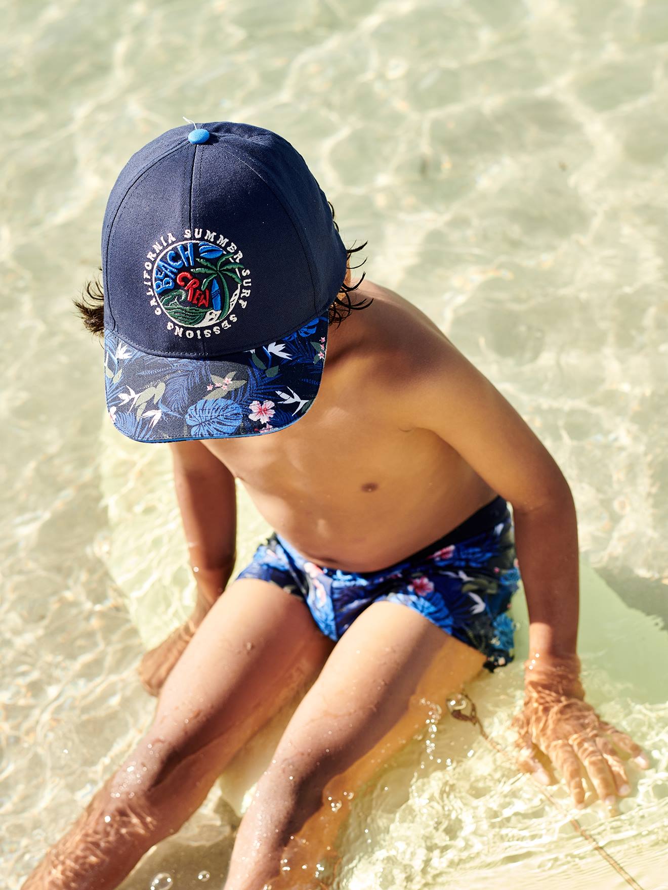 Calção de banho boxer azul marinho com estampa tropical para meninos