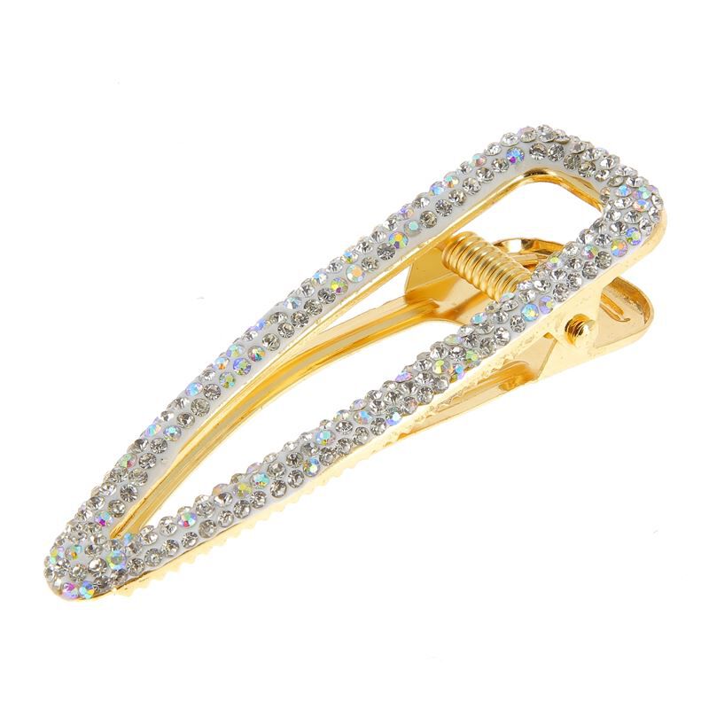 Barrette or et strass bec