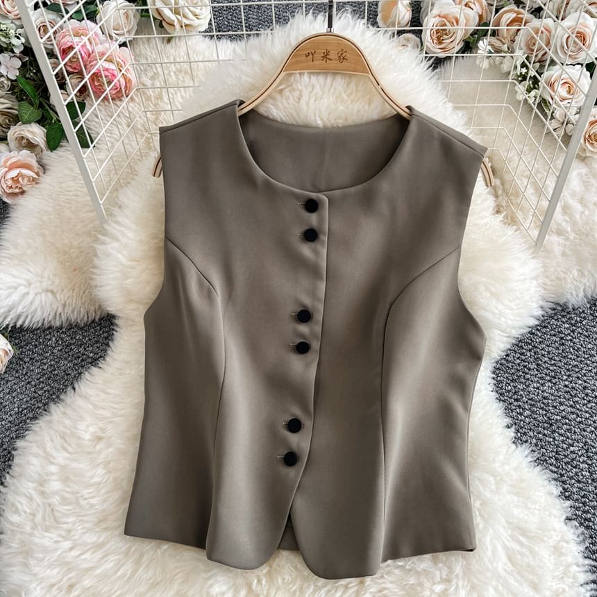 Yearnin - Set: Ronde hals, effen cropped vest met knoopjes + geplooide mini-A-lijn rok met trekkoord in de taille
