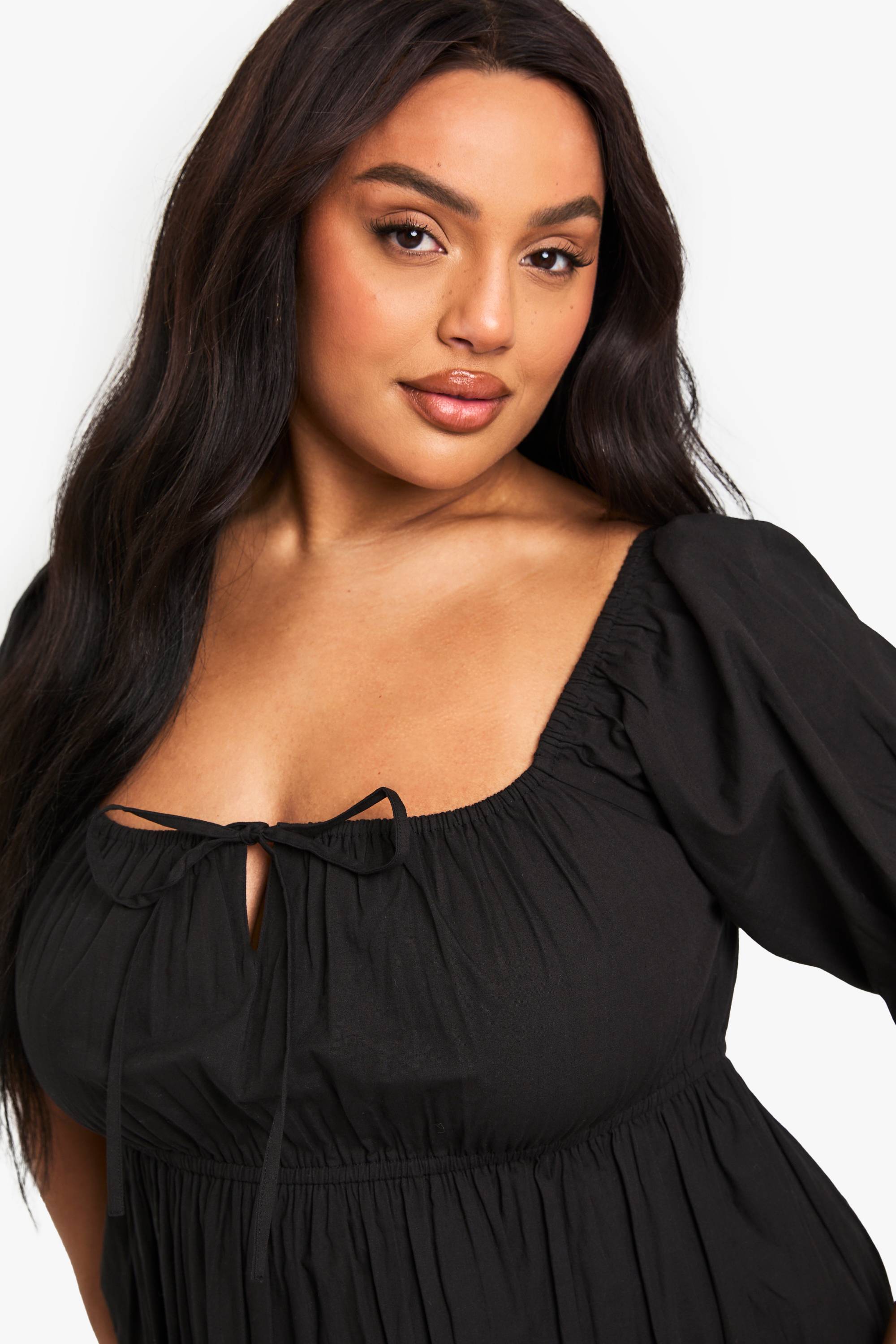boohoo Robe skater en coton plissée avec nœud à l’avant