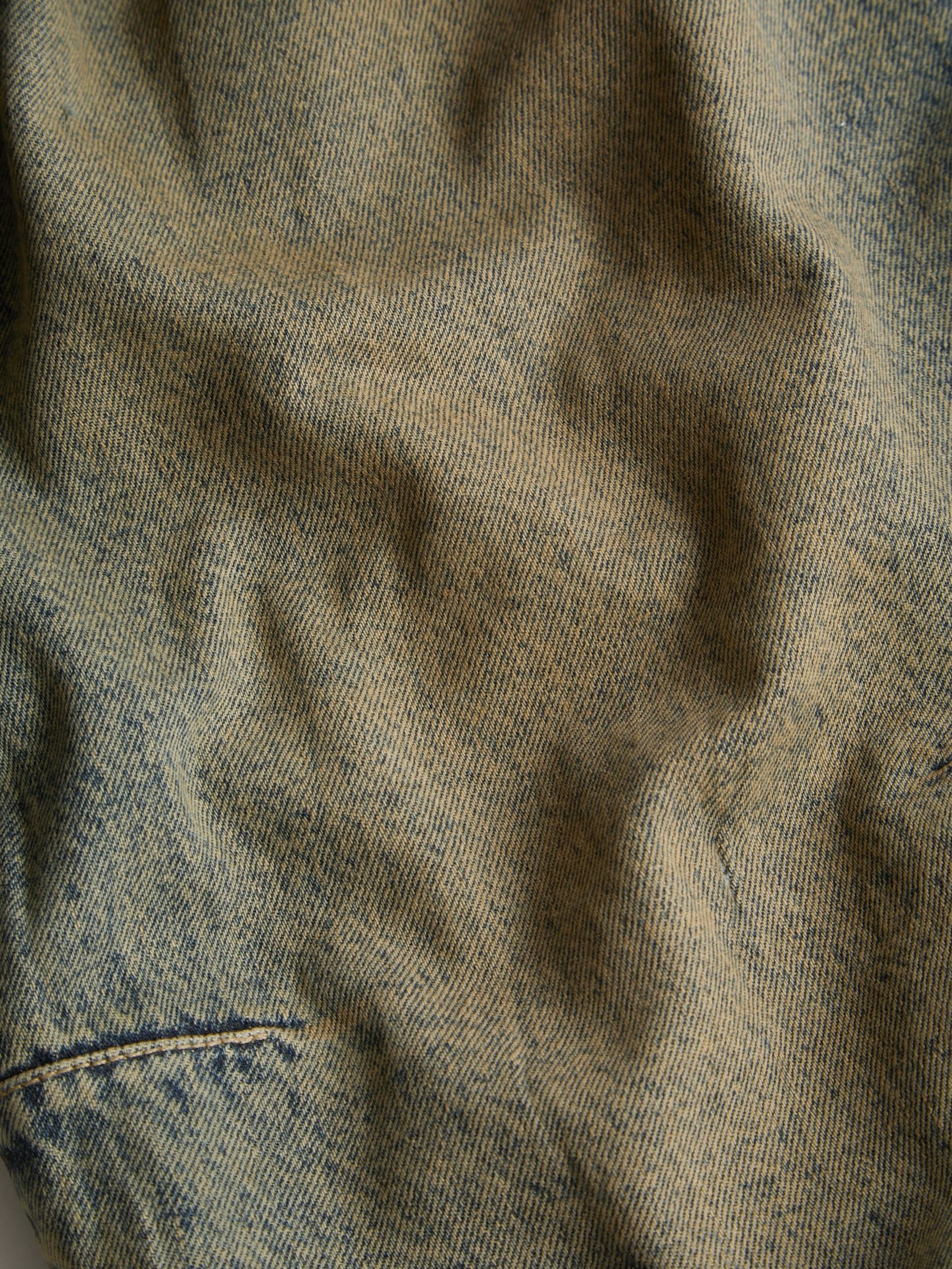 calça jeans folgada com forro de flanela