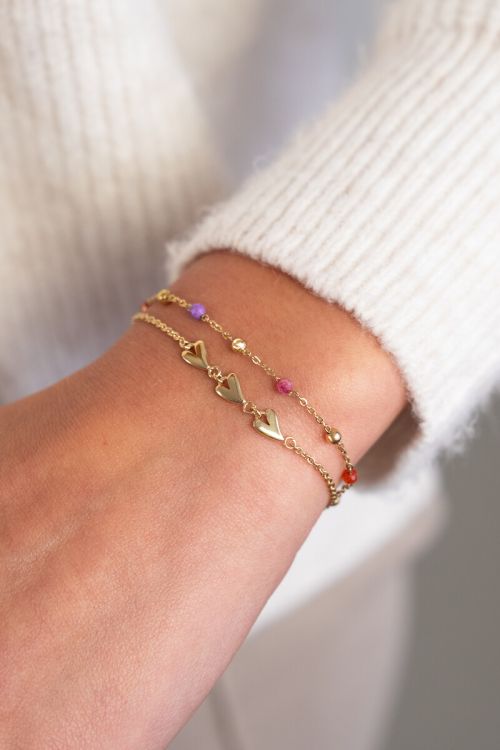 Minimalistische armband met drie hartjes
