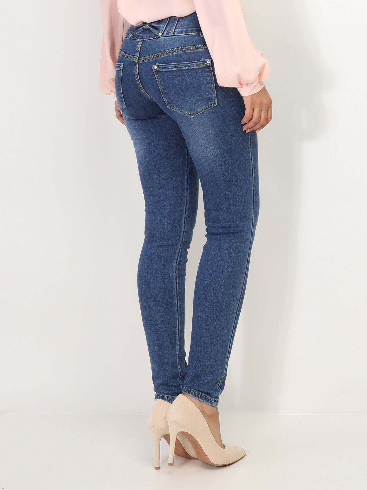 Jeans skinny avec un noeud à l'arrière- Bleu