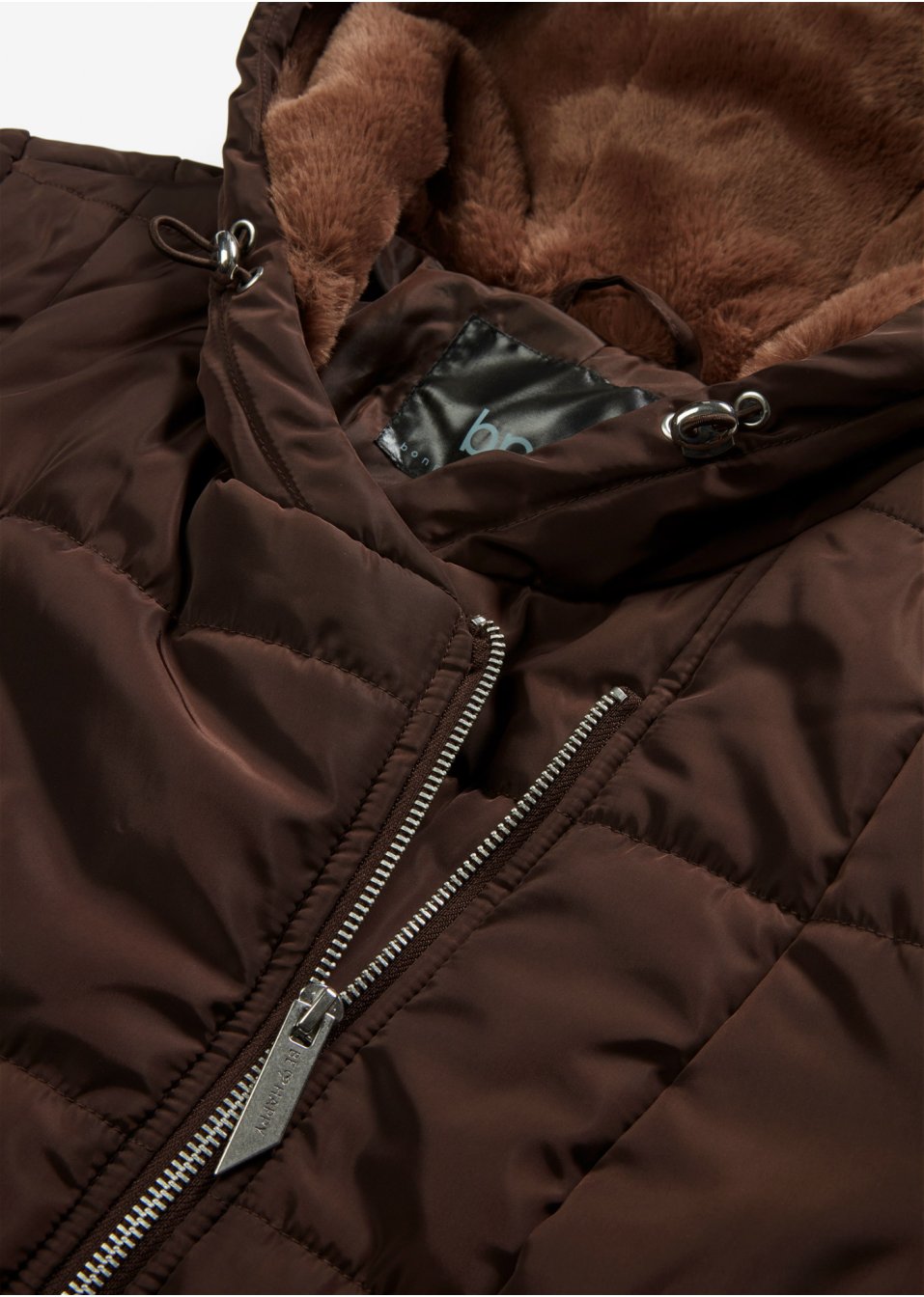 Manteau matelassé avec zip asymétrique
