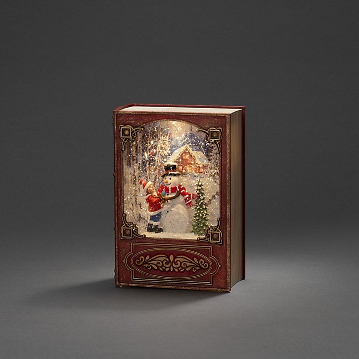 Lanterne à neige LED blanc chaud livre rouge « Bonhomme de neige avec enfant »