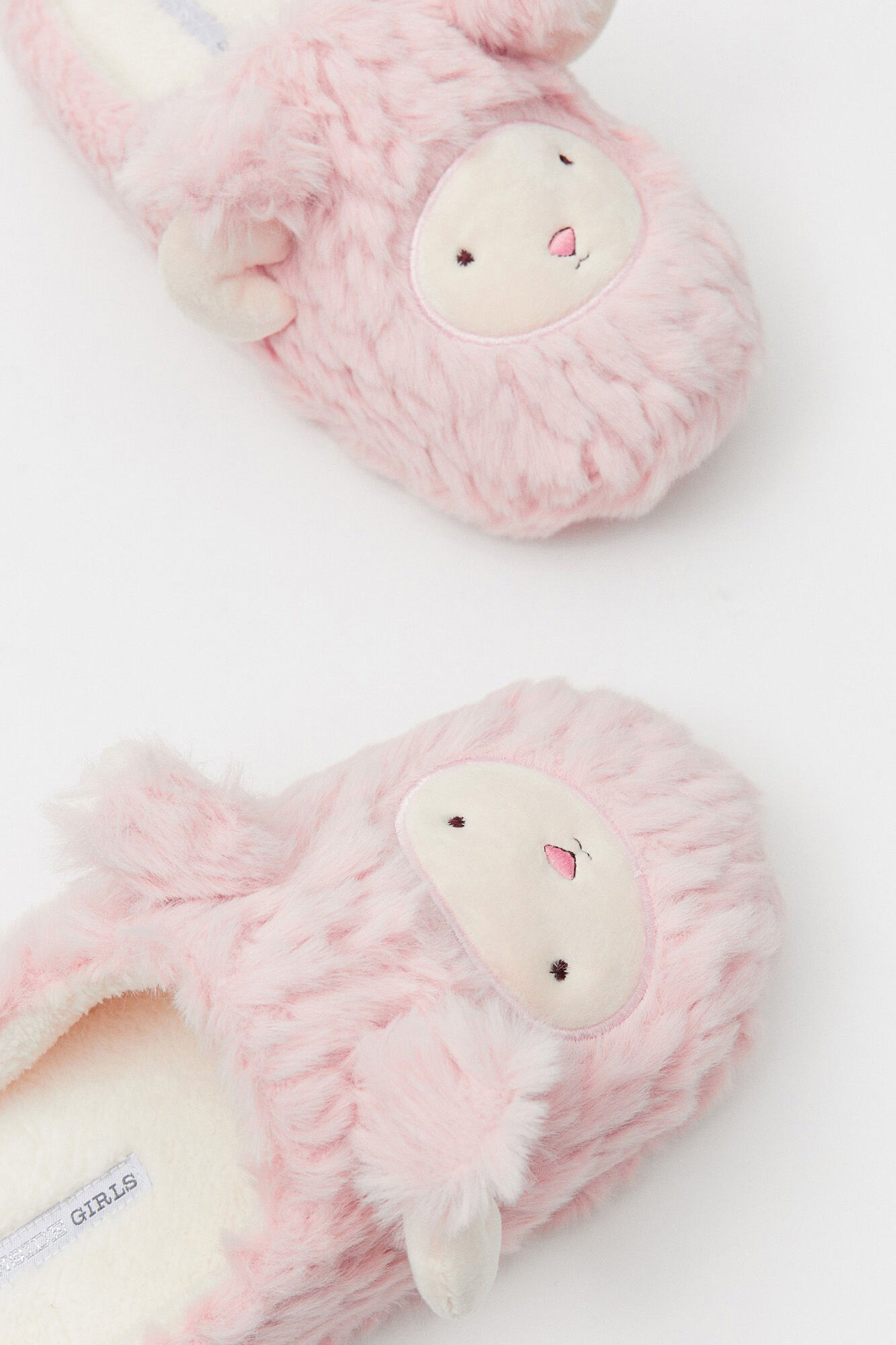 Botas de pele de carneiro rosa