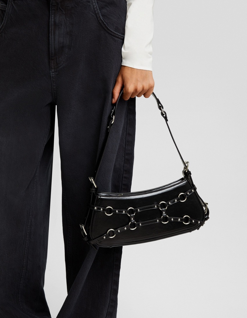 Bolsa de ombro ajustável com ilhós