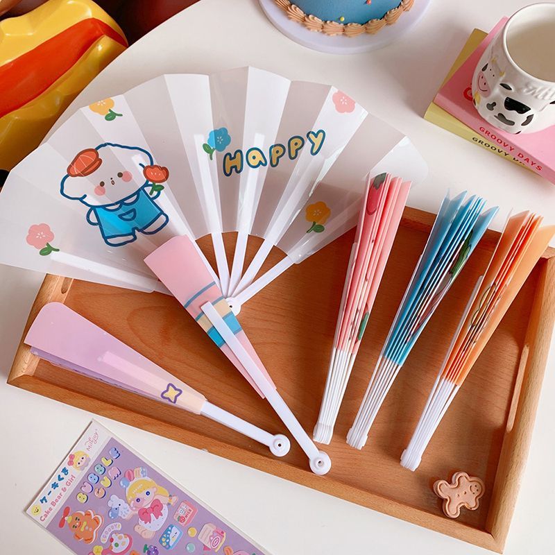 Schattige essentials - Cartoon opvouwbare plastic handventilator