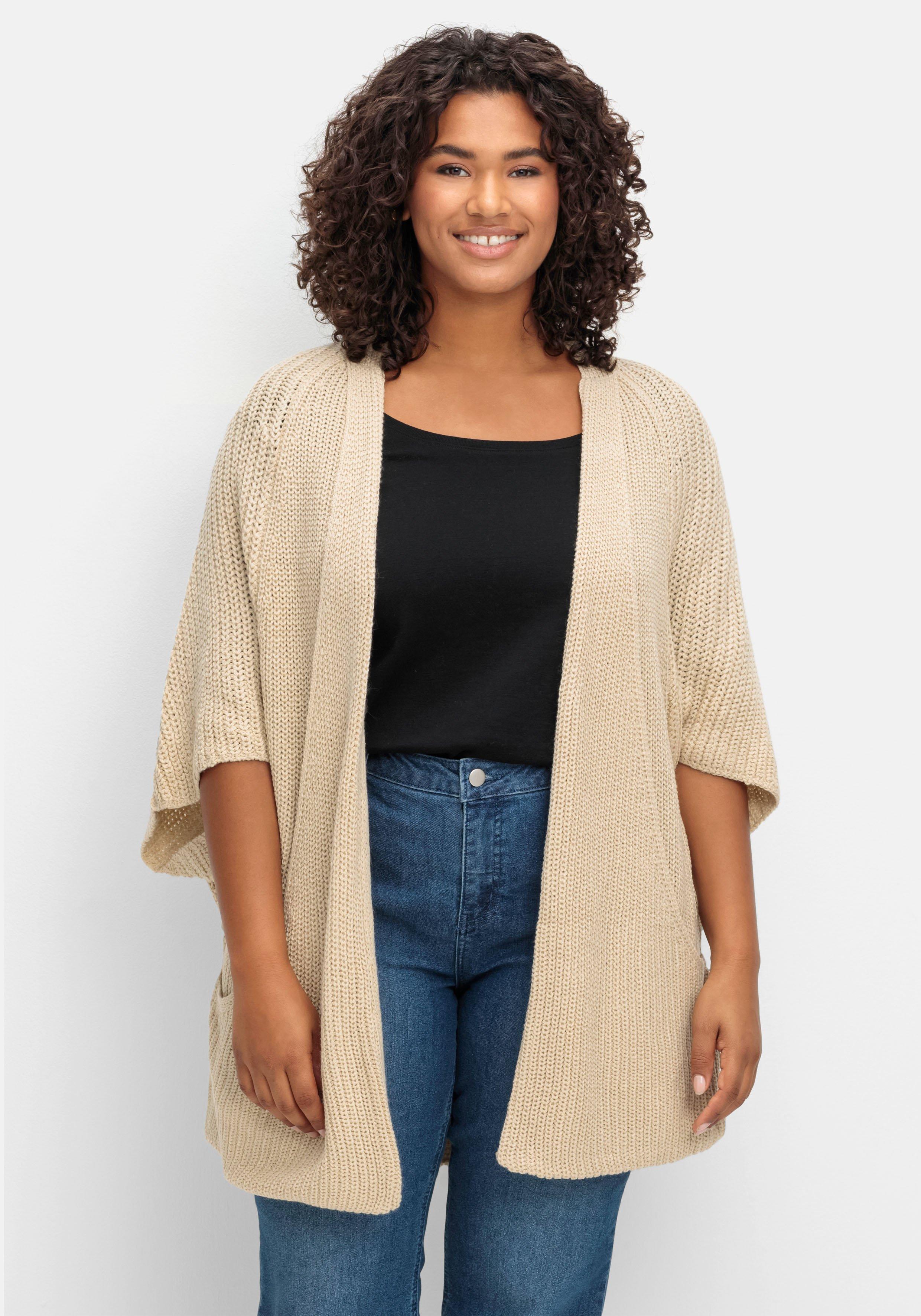 Strickjacke in offener Form, mit verkürztem Ärmel
