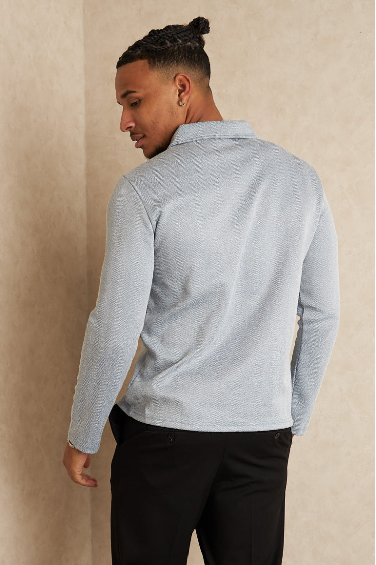 Pull à motif chevron bleu