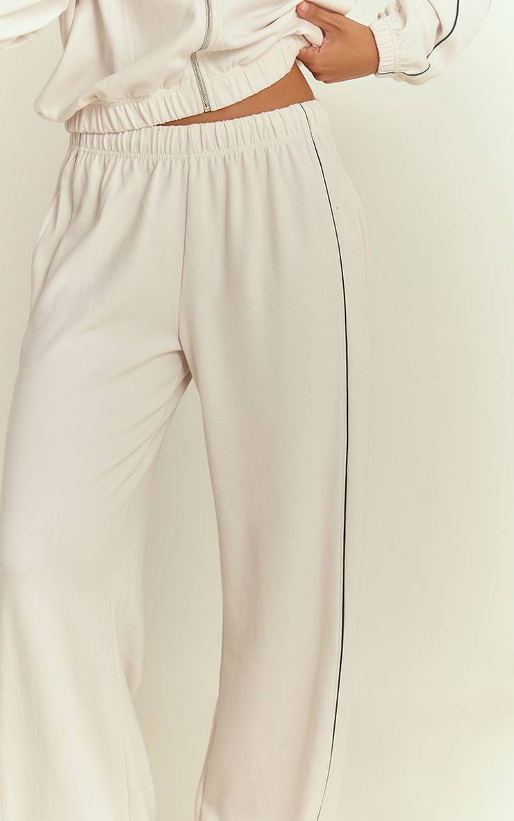 Crème Jogging Interlock À Jambes Larges Avec Passepoil Contrasté