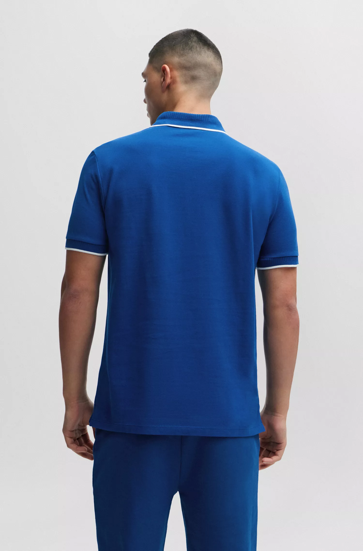 Camisa polo HUGO vermelha em piqué de algodão com corte slim e etiqueta vermelha com o logotipo.
