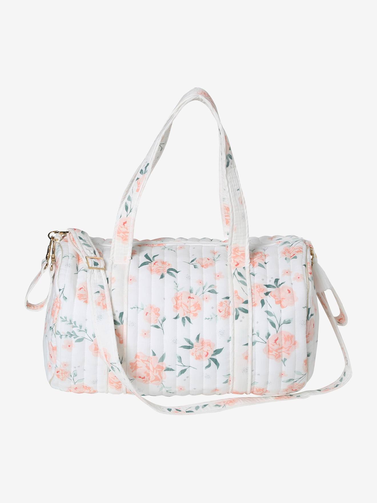 Bolsa de maternidade Baby Roll em gaze de algodão branca tamanho médio com estampa.
