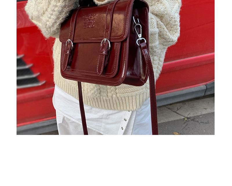 Letheroni - Crossbodytas met gesp en imitatieleren letters