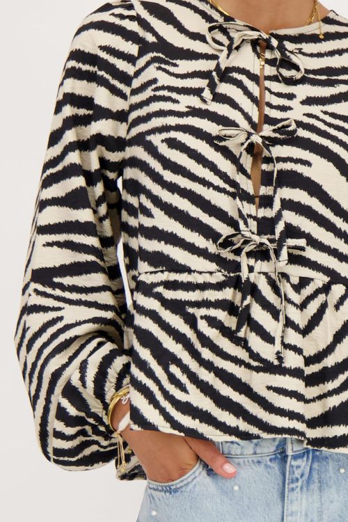 Zwarte-beige zebra top met strikjes