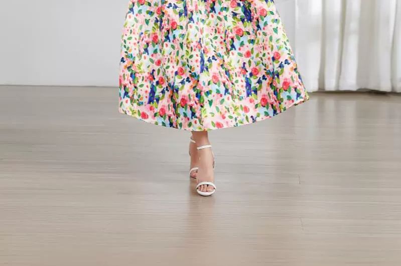 Aurora - Mouwloze maxi-A-lijnjurk met bloemenprint