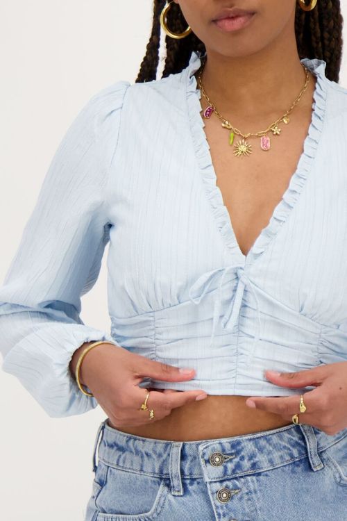 Lichtblauwe crop top met ruffles en smock