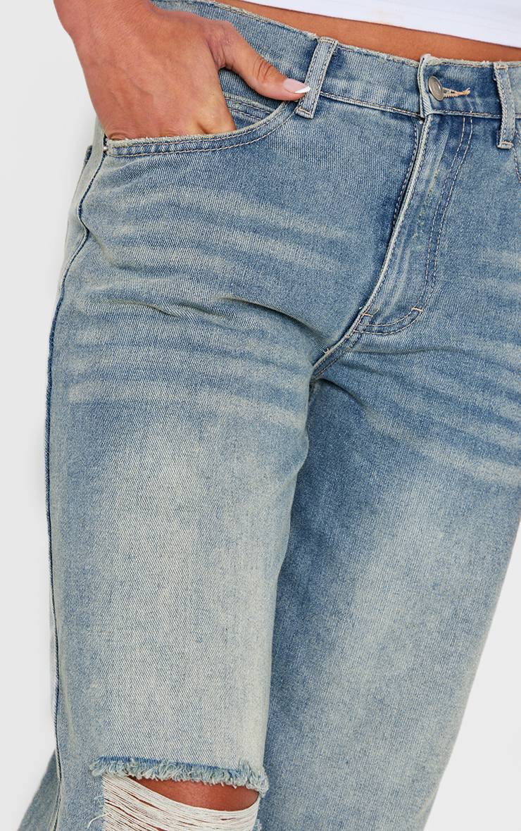 Délavage Vintage Jean Boyfriend Vintage Déchiré Aux Genoux Ourlet Effiloché