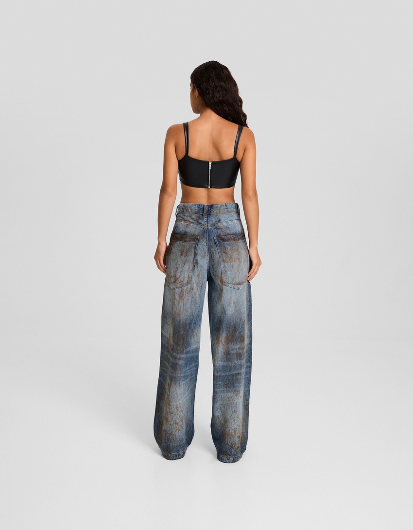 Calça jeans super larga com estampa de respingos de tinta