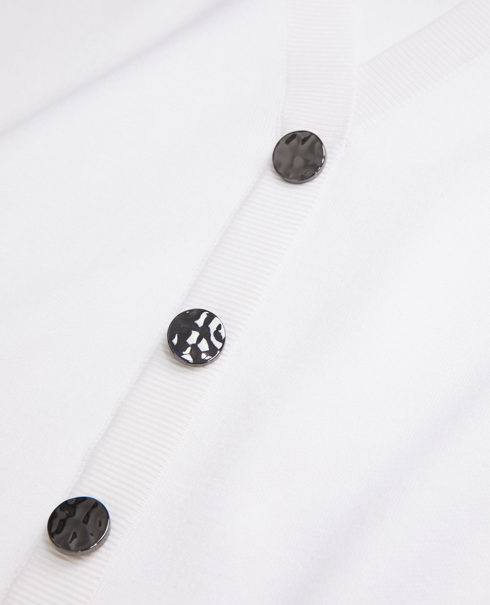 Ecru sweater with buttoning on the back