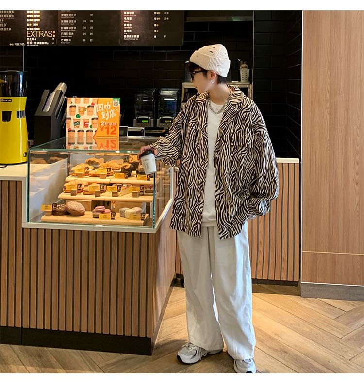Femilina - Oversized shirt met lange mouwen, reverskraag en zebraprint