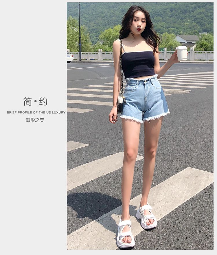 Everose - Denim shorts met hoge taille en rafelige zoom