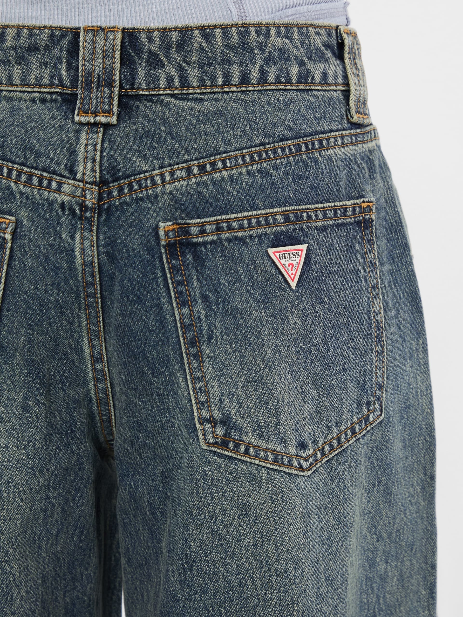 Calça jeans de perna larga com bolsos duplos aplicados da GUESS Originals