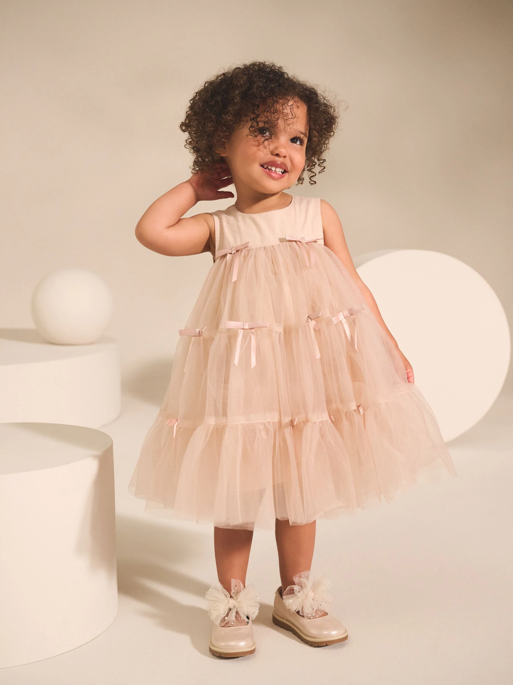 Lichtroze - Mouwloze mesh feestjurk met strik (3mnd–7jaar)