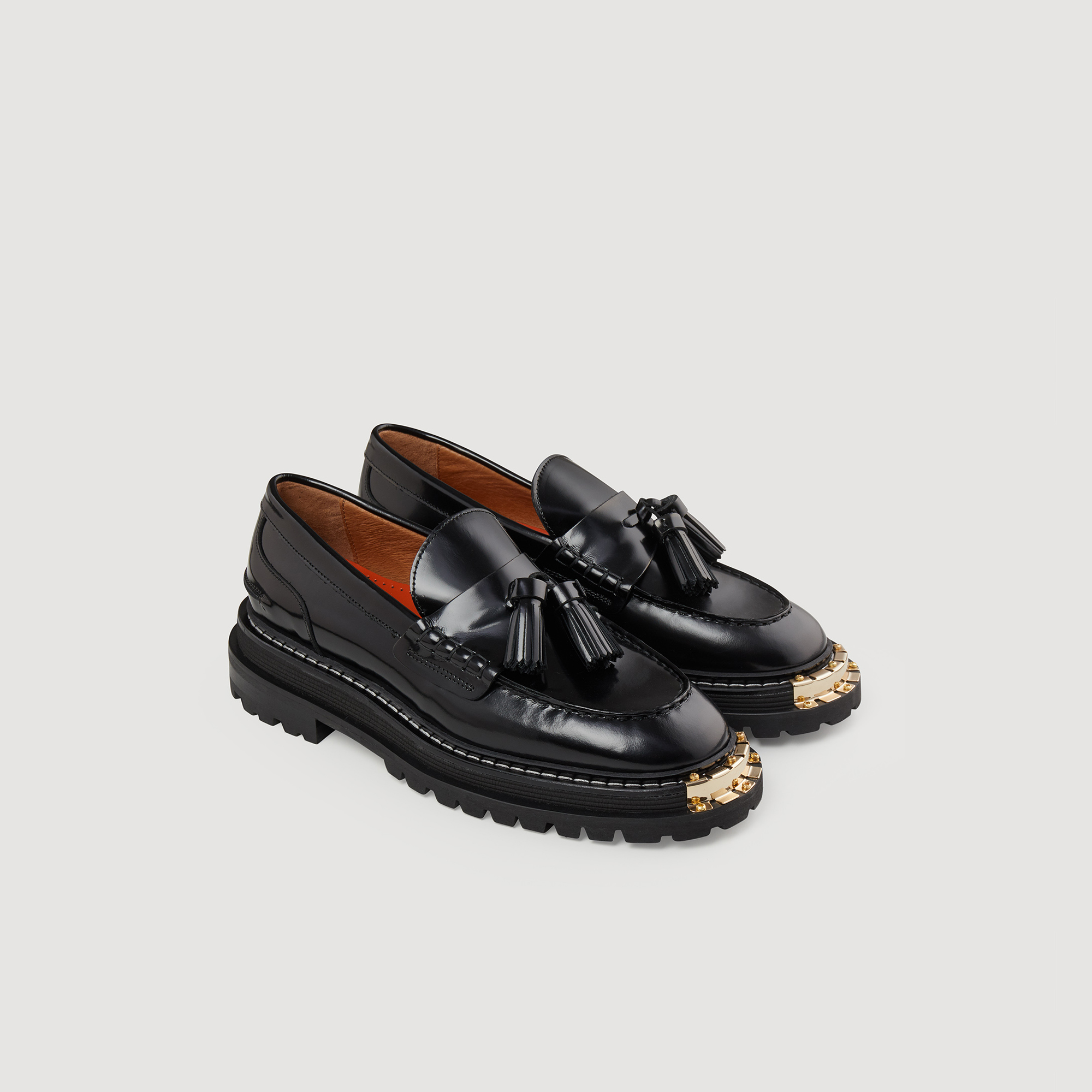 Mocassins en cuir á semelle epaisse