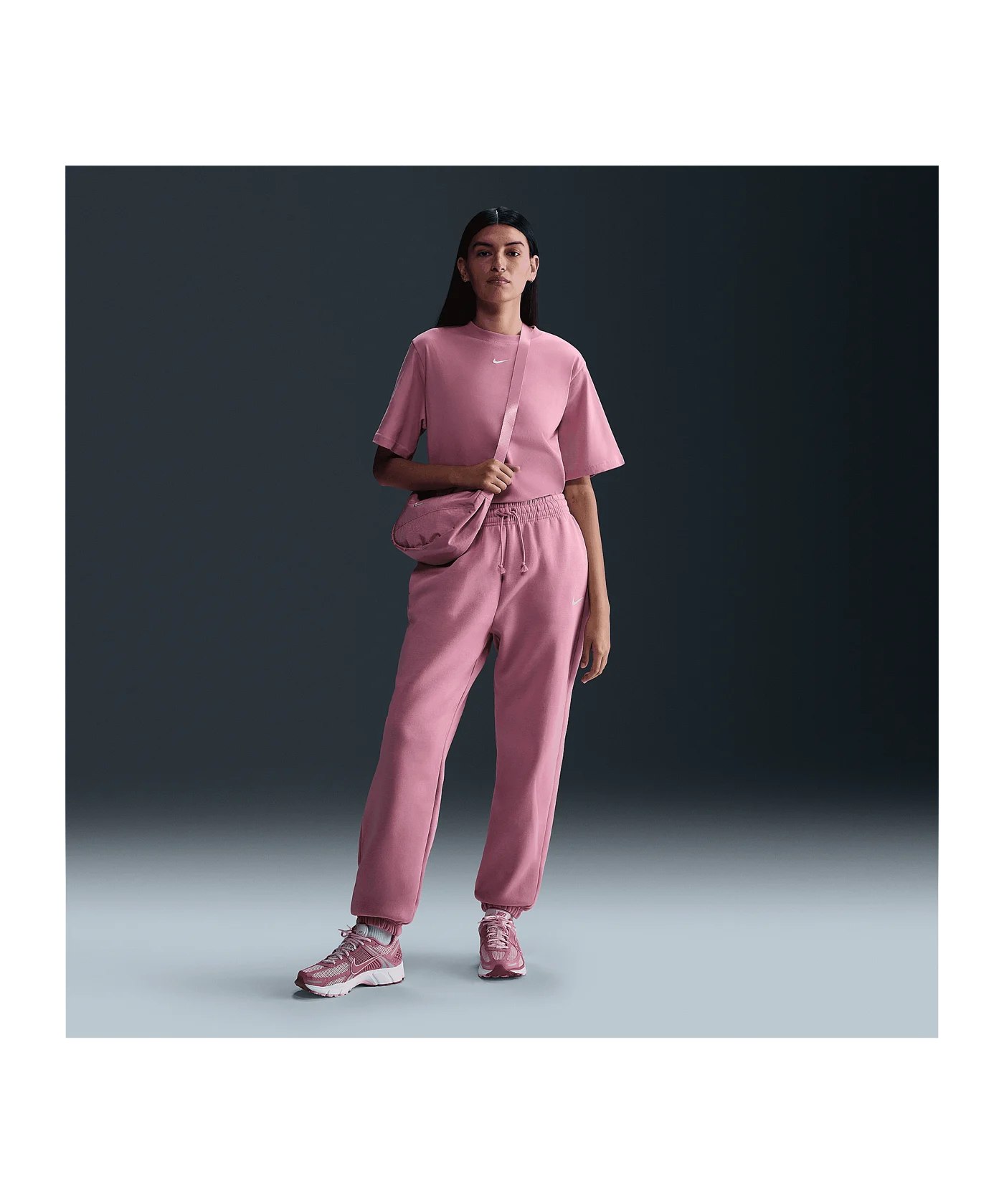 Nike Phoenix Fleece High-Waisted Oversized Jogginghose Damen Pink F699