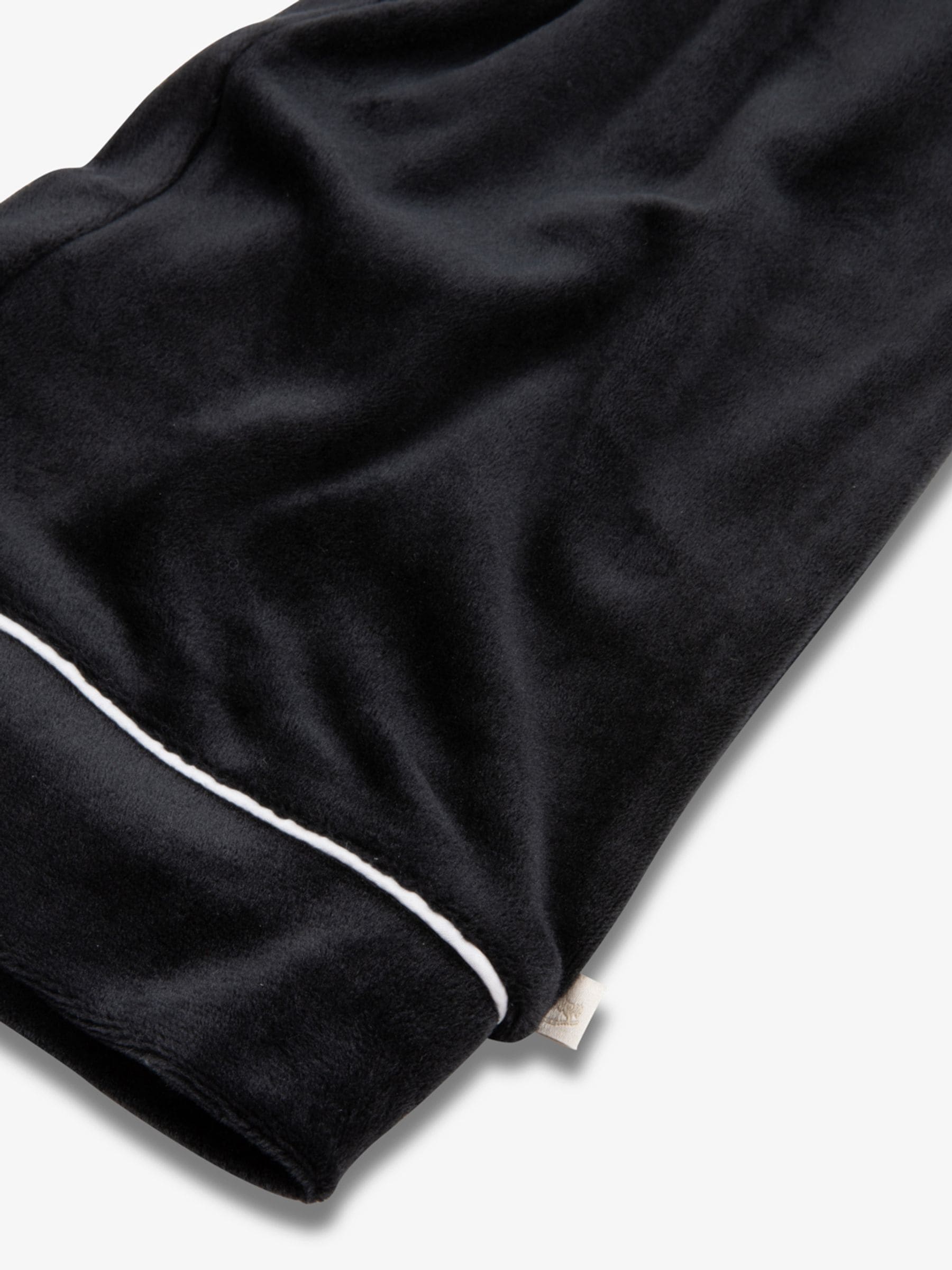 Zwart - The Little Tailor Luxe kerstpyjama voor kinderen van zacht aanvoelend velours