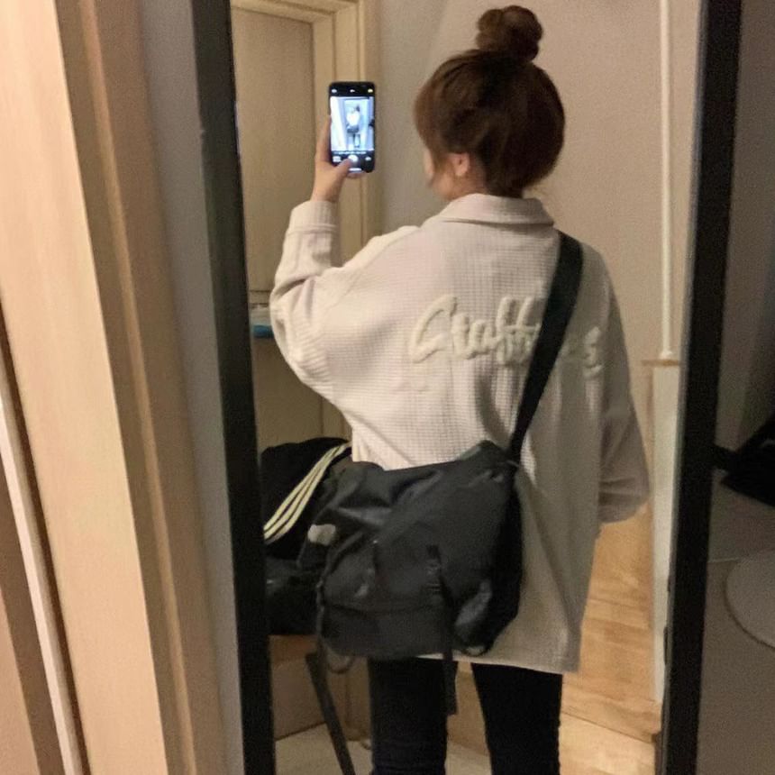 Essere - Vest met rits en appliqué op de kraag