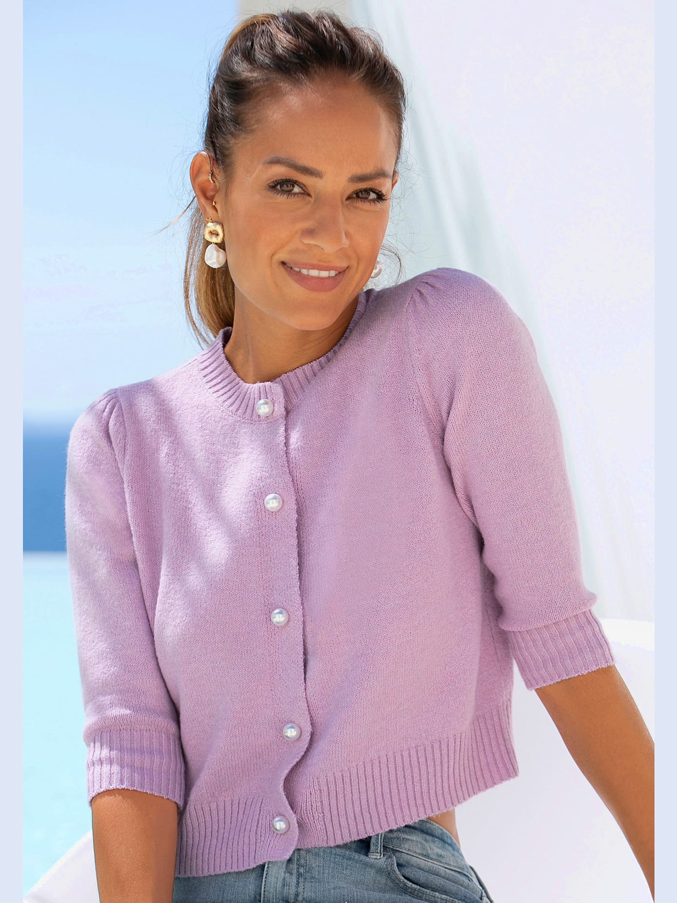 Veste en tricot courte avec encolure ronde