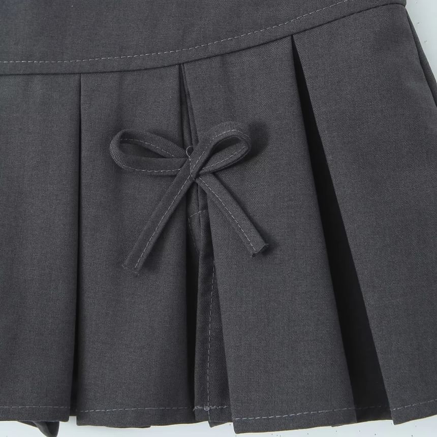 Omelia - Lage taille effen strik accent geplooide split mini A-lijn rok