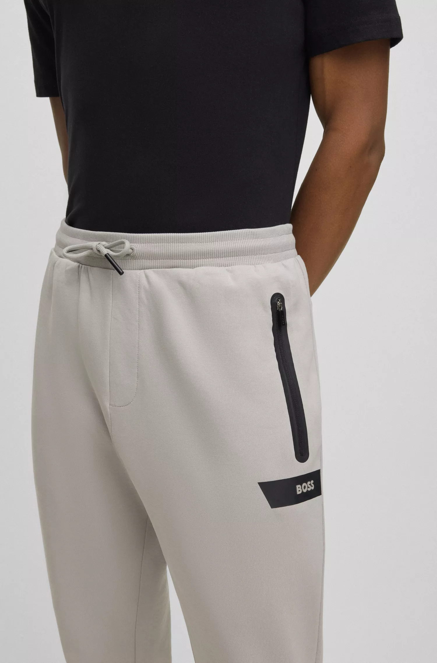 Calça de fato de treino BOSS em mistura de algodão verde com faixa com o logótipo.