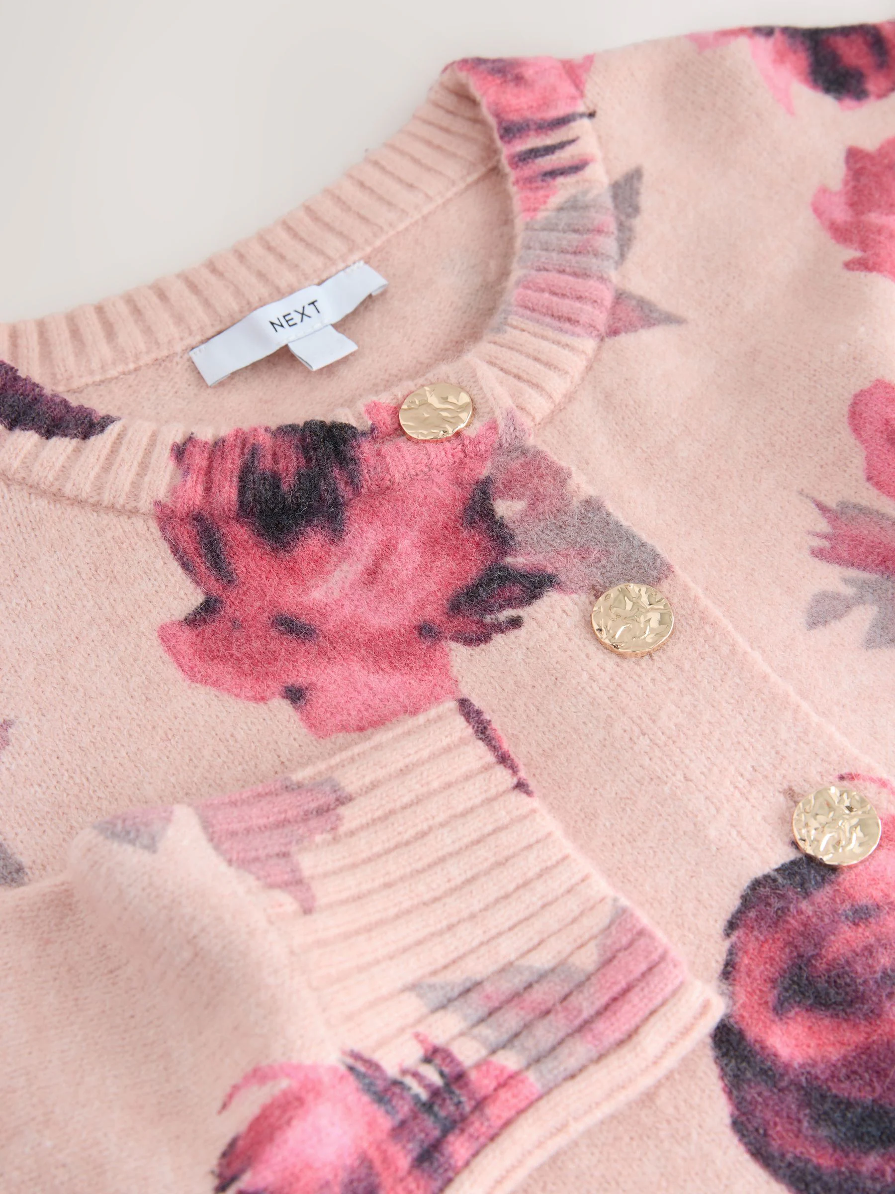 Roze met bloemenprint - Gebreid vest met ronde hals
