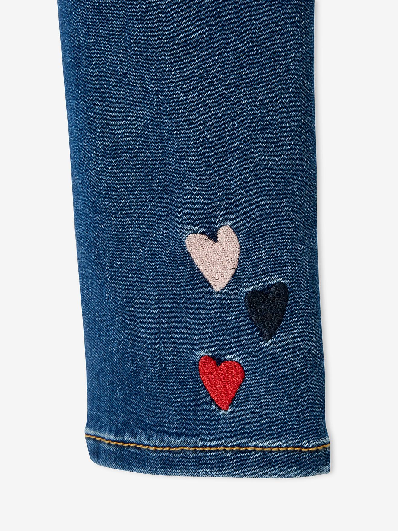 Calça legging feminina em tecido atoalhado bordado com efeito jeans, na cor cinza jeans.