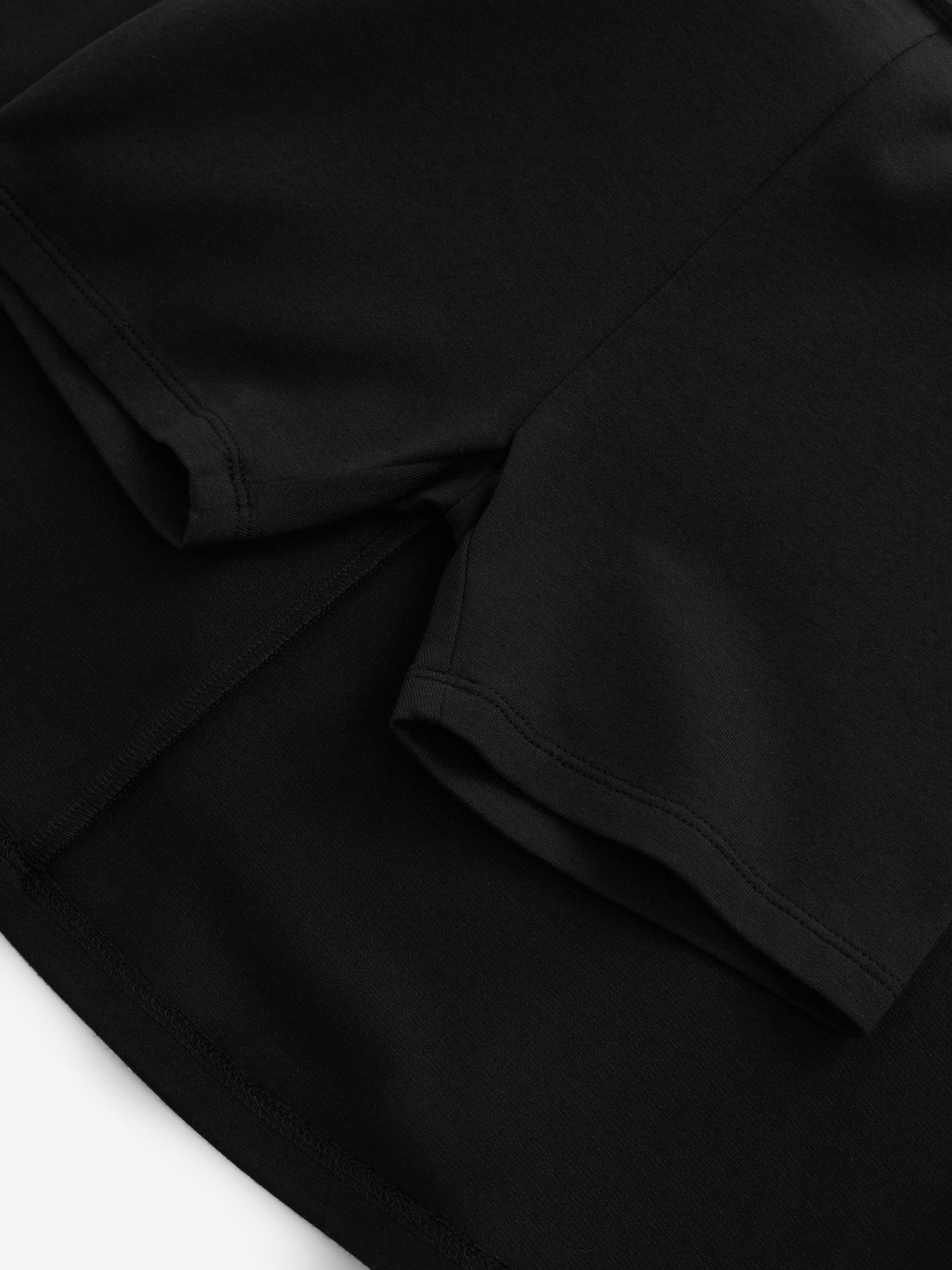 Zwart - Aantrekskirt voor school met jersey stretch (3-17jr)