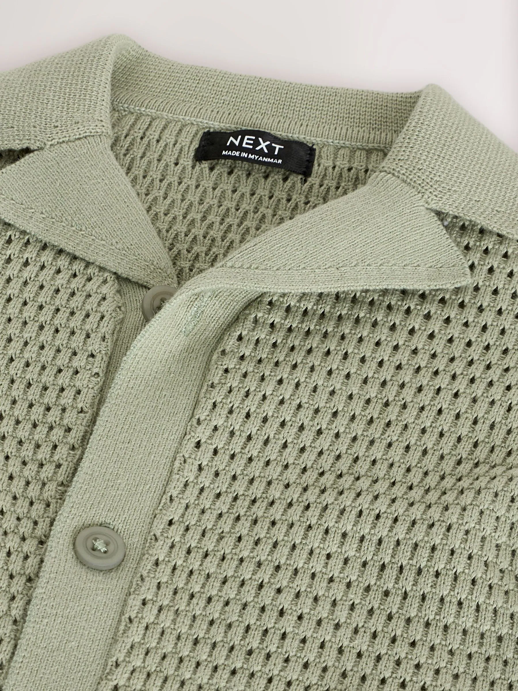 Groen met palmenprint - Gebreid poloshirt met reverskraag en korte mouwen met textuur (3mnd -7jr)