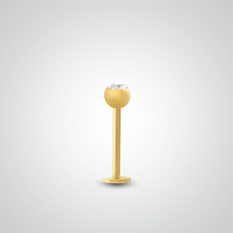 Piercing hélix en or jaune avec boule et zircon