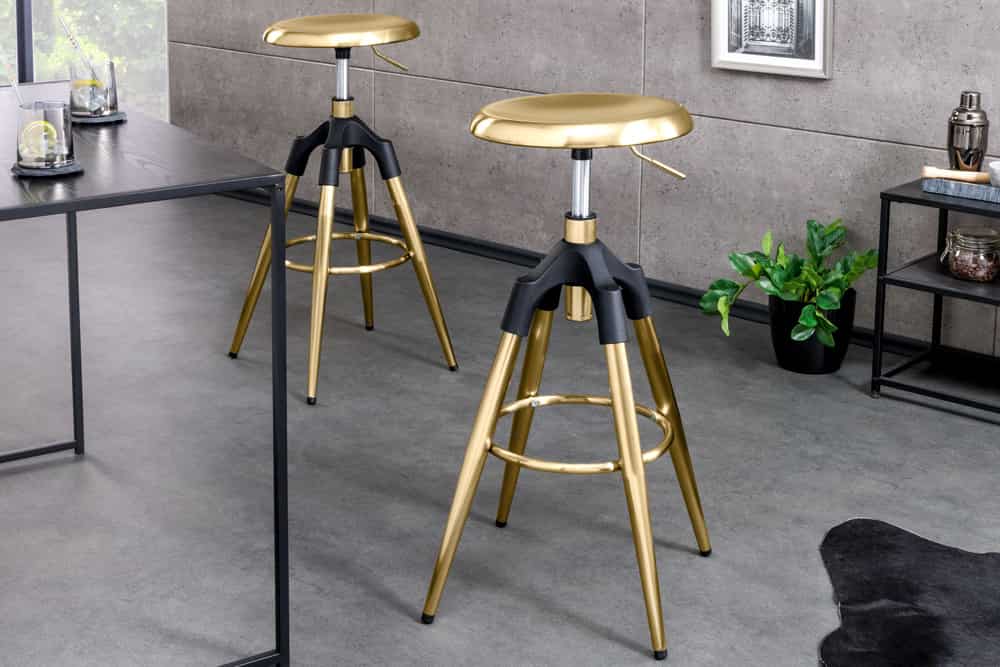 Höhenverstellbarer Barhocker INDUSTRIAL gold schwarz Metall rund drehbar Industrial Design