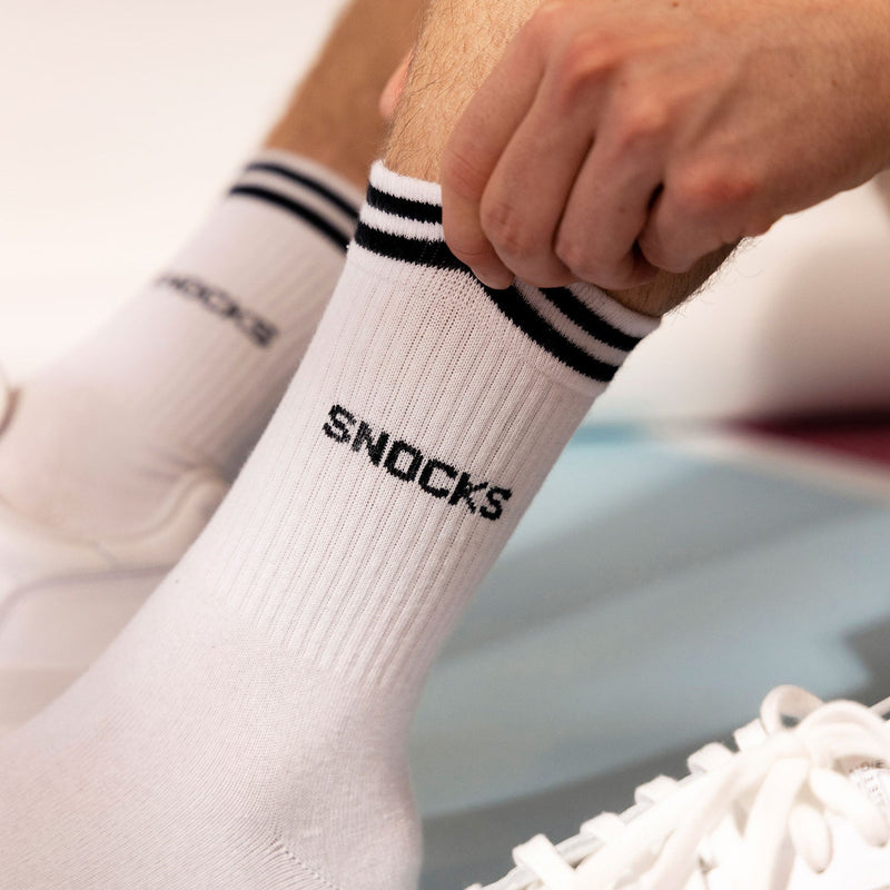 Hohe Sportsocken mit Streifen aus Bio-Baumwolle Schwarz-Weiß