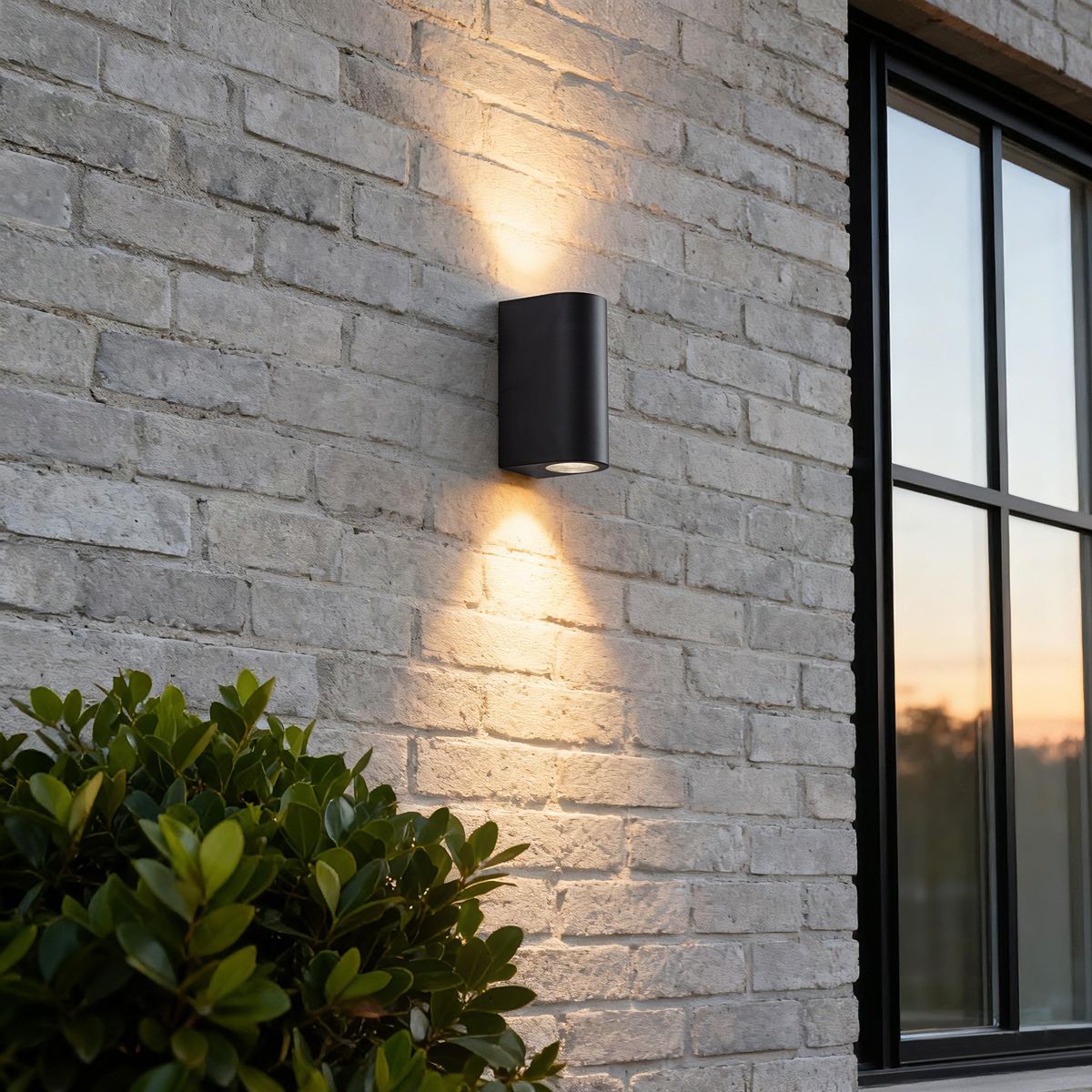 Moderne buiten wandlamp zwart kunststof ovaal 2-lichts - Baleno