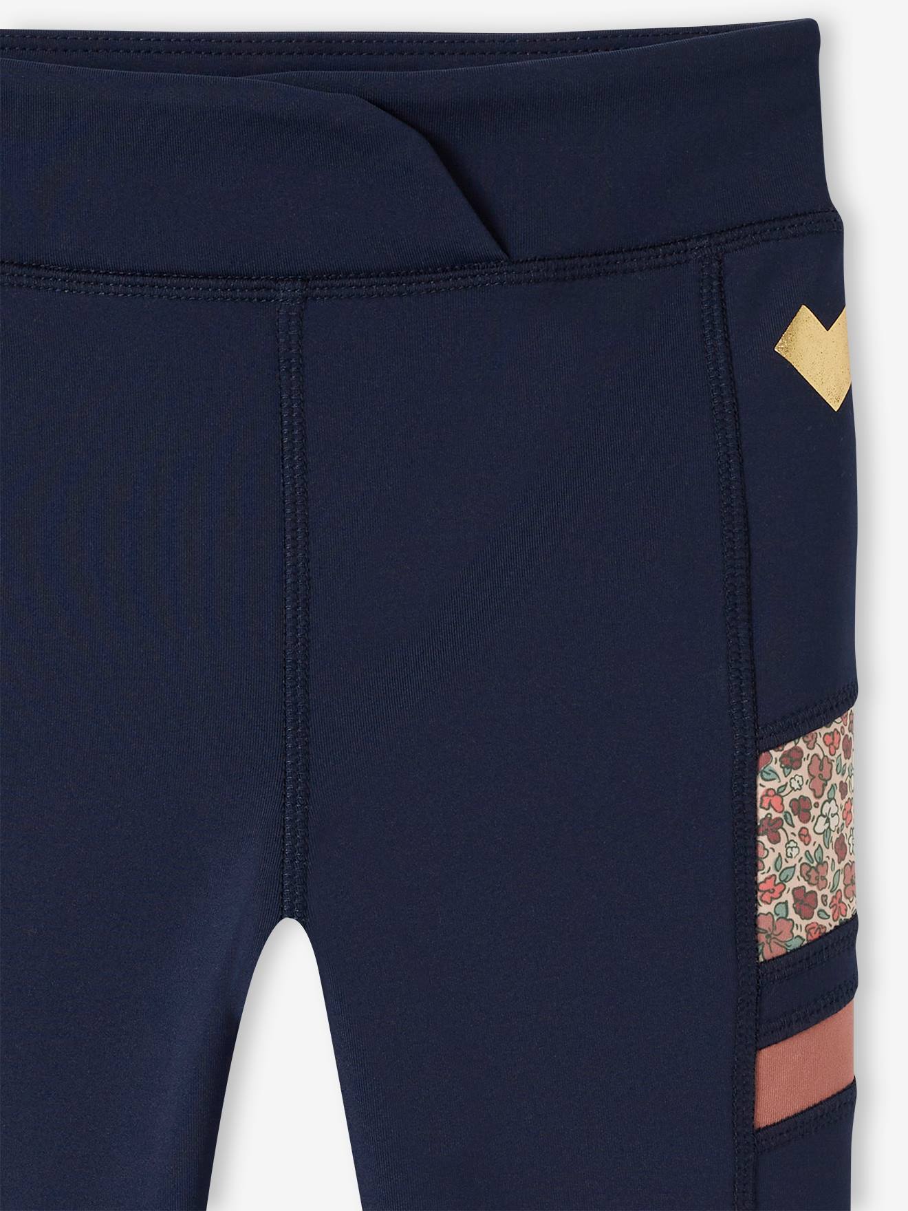 Leggings esportivas azul-marinho em tecido técnico com detalhes sofisticados para meninas.
