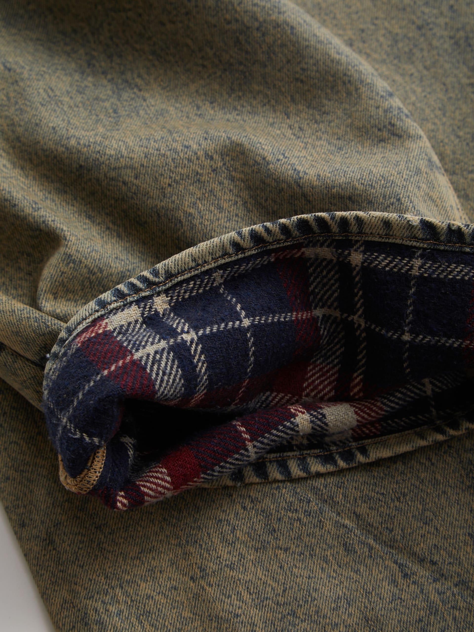 calça jeans folgada com forro de flanela